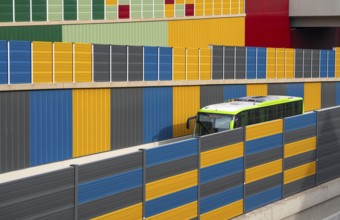 Colourful noise barriers on the A52 motorway, at the Essen-Rüttenscheid junction, the noise