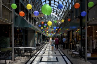 Calwer Passage, shopping arcade, shopping centre, decorated, roofed, lanterns, footballs,