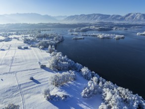 Aerial view of a lake in front of mountains, winter, snow, morning light, fog, Staffelsee, Alpine