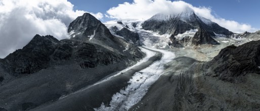 Aerial view, mountain landscape with glacier tongue Glacier de Cheilon and summit Mont Blanc de