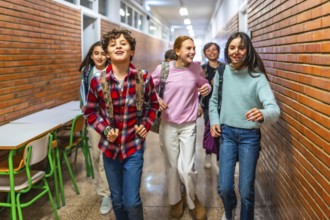 Cheerful students with backpacks rushing through the school hallway, enjoying their break between