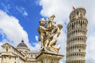Statue of angels, behind the Leaning Tower and the Cathedral of Santa Maria Assunta, Pisa, Tuscany,