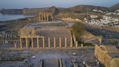 Drone shot, first morning light, Lindos, Acropolis of Lindos, Propylaea with staircase, Temple of