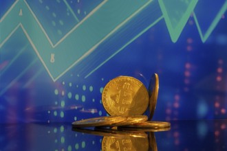 Close-up of symbolic bitcoins