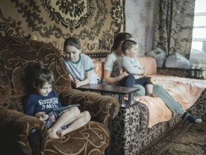 Evacuated children from a village near the front, Spodovivka, Ukraine, Europe