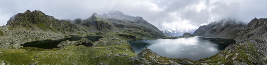 Mountain landscape with cloudy mountain peaks, mountain lakes Wangenitzsee and Kreuzsee, aerial