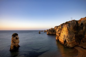 Colourful cliffs and rocks at sunrise on the beach, Praia da Dona Ana, Lagos, cliffs, Atlantic