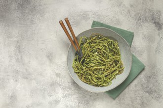 Spaghetti with pesto sauce, homemade, no people