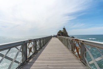 Wooden bridge together to Plage du Port Vieux in Biarritz, holiday in south-eastern France.