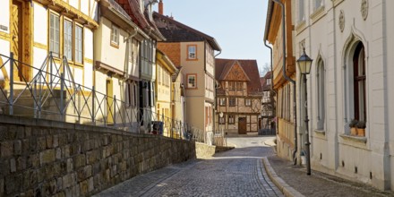 Half-timbered houses with cobblestones in Mühlenstraße, old town centre of the World Heritage town