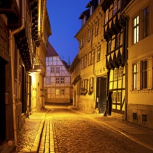 Half-timbered houses in a narrow street with cobblestones, Old Town in the evening, World Heritage