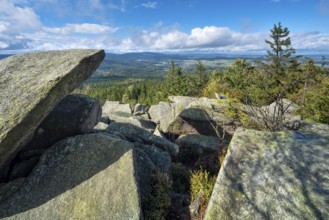 View from the Kösseine over the forests of the Fichtelgebirge, sea of boulders on the summit,