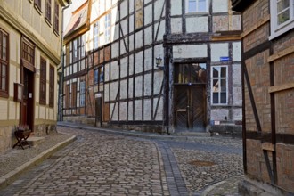 Half-timbered houses in the Finkenherd alley with cobblestones, Old Town of the World Heritage town