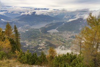 View from the summit of Mount Pizzo di Levico to the lakes in the Sugana Valley, Trentino, Italy,