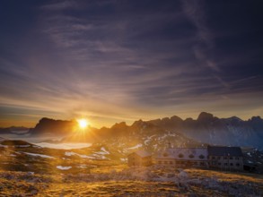 Schlernhaus at sunrise, Sassolungo Group and Catinaccio behind, Dolomites, Sciliar, South Tyrol,