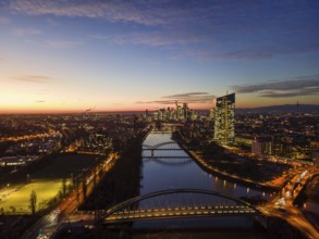 The lights in the offices of the European Central Bank (ECB) and in the skyscrapers of Frankfurt's