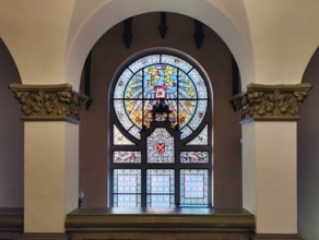 Stained glass window in the main staircase with the town coat of arms by Ferdinand Müller in