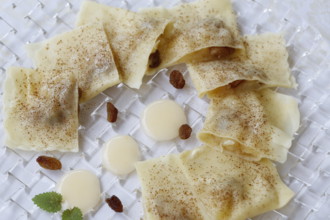 Swabian cuisine, apple dumplings, apple in pasta dough, sweet dish, dessert, vanilla sauce,