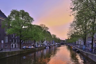 Canal in the evening light after sunset, Amsterdam, North Holland, Netherlands