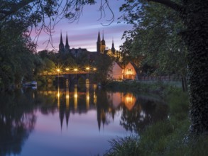 Merseburg Cathedral and Merseburg Castle reflected in the River Saale at dawn, Merseburg,