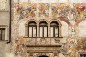 The painted façade of the Palazzo Quetta - Alberti Colico palace in Trento, Trentino, Italy, Europe