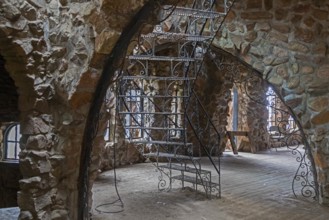 Rye, Colorado, An ornamental iron stairway in Bishop Castle. The Castle is an elaborate stone and