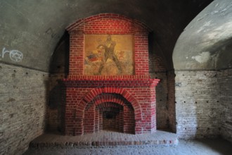 German mural The Barbarian from the First World War on the mantelpiece in Fort Napoleon in Ostend,