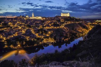 City view of Toledo with the river Tajo, blue hour, province Toledo, region Castilla-La Mancha,