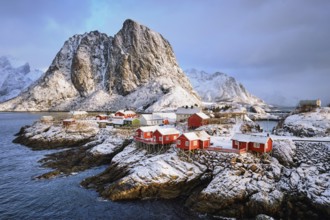Famous tourist attraction Hamnoy fishing village on Lofoten Islands, Norway with red rorbu houses