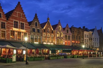 Bruges, Belgium, May 29, 2018: Bruges Grote markt square famous tourist place with many cafe and