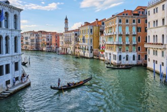VENICE, ITALY, JUNE 27, 2018: Grand Canal with boats and gondolas on sunset, Venice, Italy, Europe