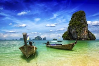 Long tail boats on tropical beach (Pranang beach), Krabi, Thailand, Asia