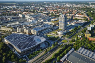 MUNICH, GERMANY, JULY 08, 2018: Aerial view of BMW Museum and BWM Welt and factory and Munich from