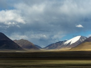 Mountain landscape and vast plains in the highlands of Tibet, China, Asia