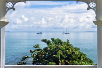 View from the garden pavilion of a hotel to the bay with sailing ships, travel, holiday, sea, Arlie