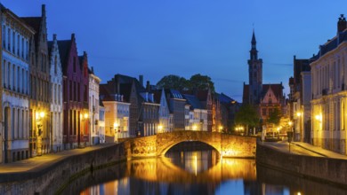 Panorama of Bruges (Brugge) canal in the evening twilight, Belgium, Europe