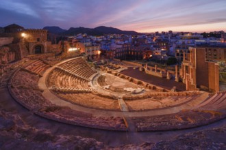 Teatro Romano, blue hour, Roman amphitheater, in the old town of Cartagena, Murcia region, Spain,