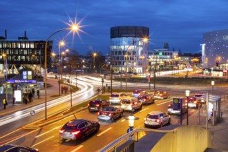 Evening city centre traffic in Essen, large intersection, roundabout, Berliner Platz, this area