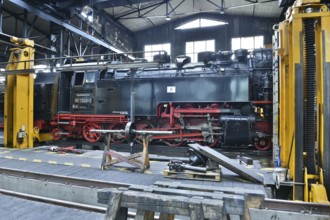 Steam locomotive of the Harz narrow gauge railway for maintenance in the workshop, Wernigerode,
