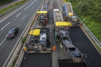 Essen, North Rhine-Westphalia, Germany, Road construction, Asphalt pavers and road rollers lay new,