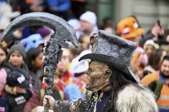 Person dressed up as a goth at the Wey guild on Rose Monday, Güdismäntig, Lucerne Carnival 2024,