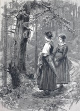 Two woman standing in front of a birdhouse by a tree on a path in the Black Forest, around 1890,