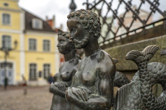 Bronze figures of Nix and Nixe at the landmark Wasserkunst, Hanseatic city of Wismar,