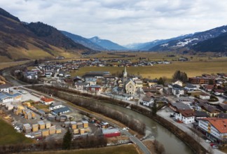 Drone image, residential buildings, view of village with parish church, Niedernsill, Salzach,