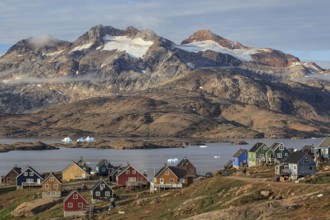 Inuit settlement at a fjord with icebergs, mountainous, autumn, sunny, Tasiilaq, East Greenland,
