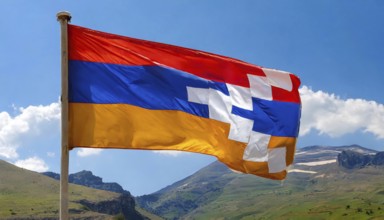 The flag of Nagorno-Karabakh flutters in the wind
