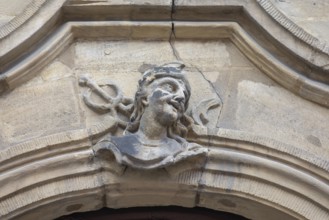 Bust above an entrance gate of a historic house, Bamberg, Upper Franconia, Bavaria, Germany, Europe