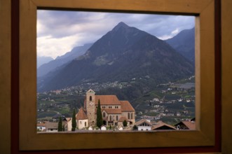 Photopoint, New Parish Church Maria Himmelfahrt, picture frame, framed, behind Mutstpitze, Schenna,