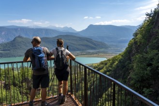 View from the hiking trail of the Rastenbach gorge to Lake Kaltern, near the village of Kaltern, in