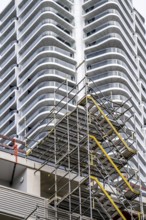 Facade of the Grand Tower building, in Frankfurt am Main, green facade, residential building,
